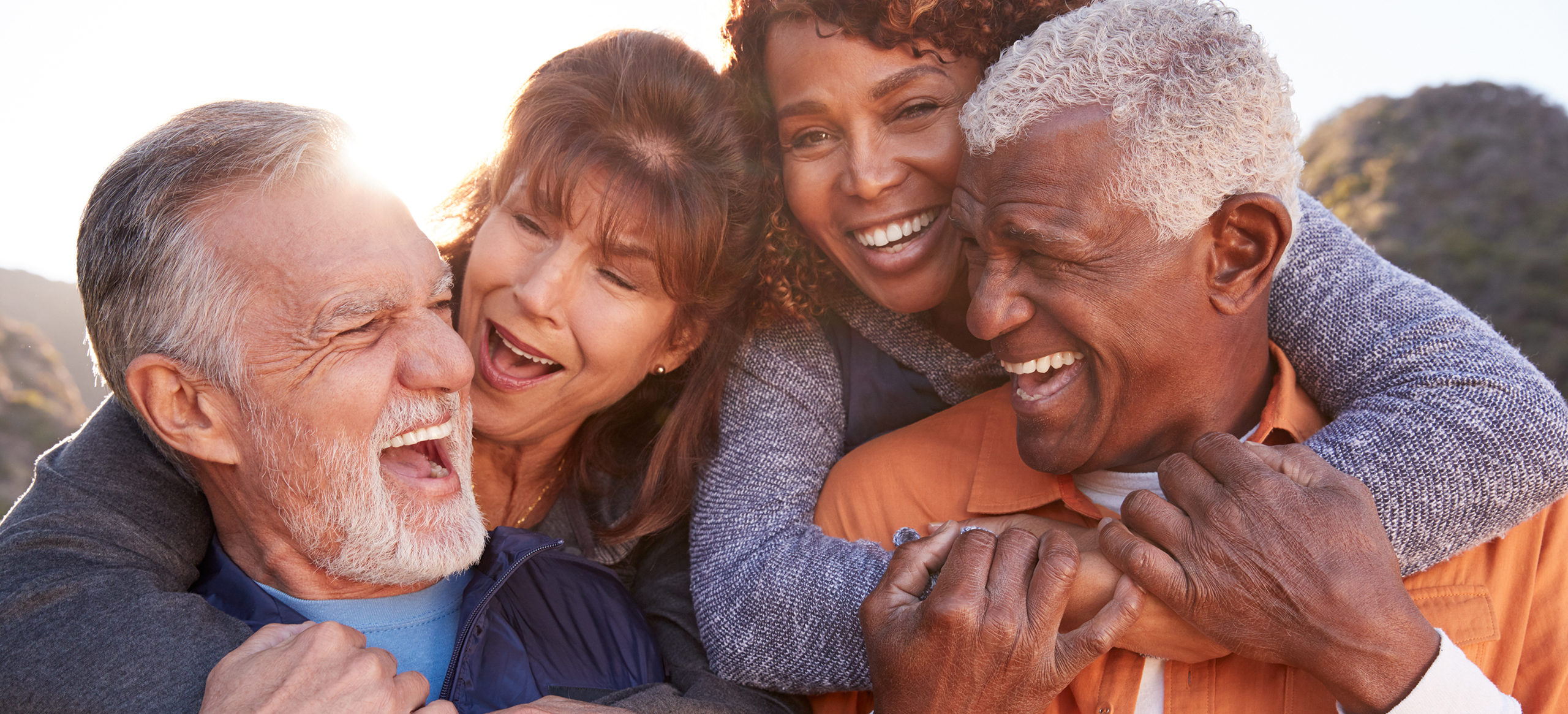 Friendly couples enjoying time together outside